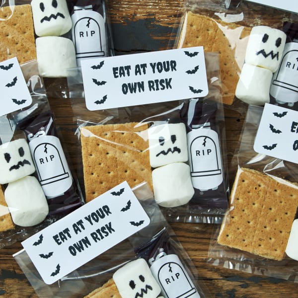 Boo your friends for halloween with cute bags labeled 