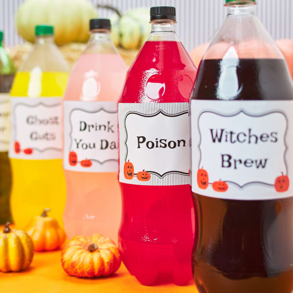 Assortment of 2-liter sodas and drinks with Halloween themed labels