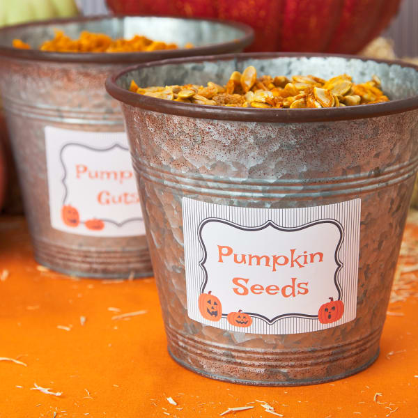 Large Halloween themed labels on metal buckets