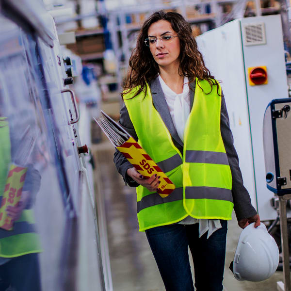 Industrial inspection professional running an examination in a facility