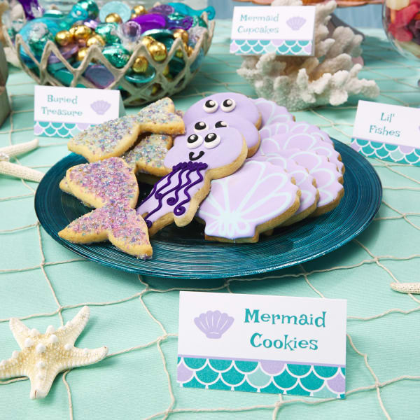 Mermaid cookies on blue plate with starfish