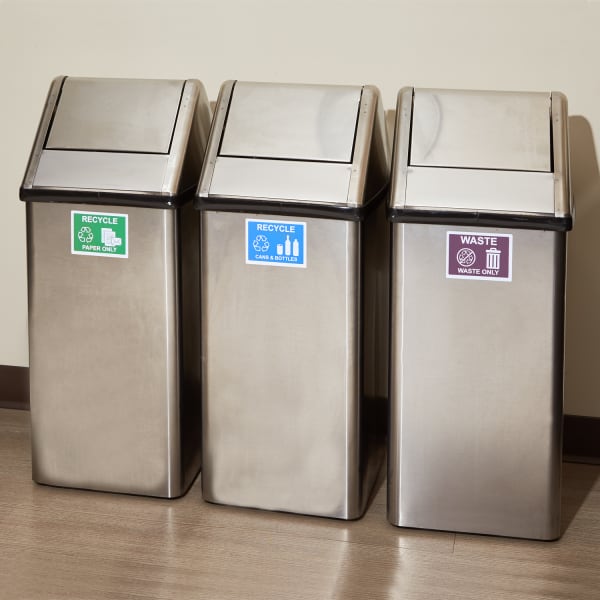 removable custom labels for stainless steel on three office trash cans for recycling