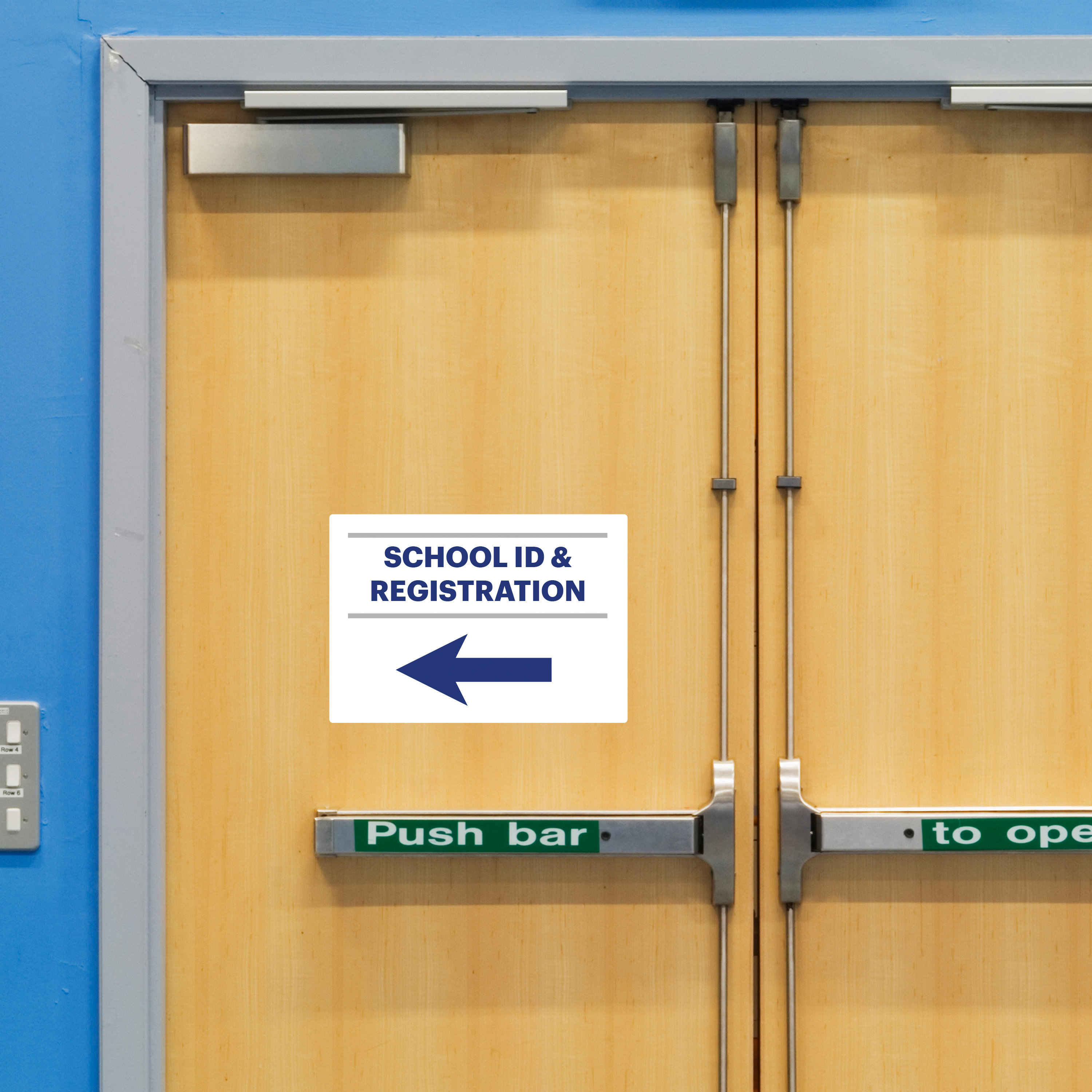 An example of a directional sign which reads "School ID & Registration" with a large arrow pointing to the left. The sign is printed on Avery 61515 removable sign labels designed for doors and walls. 