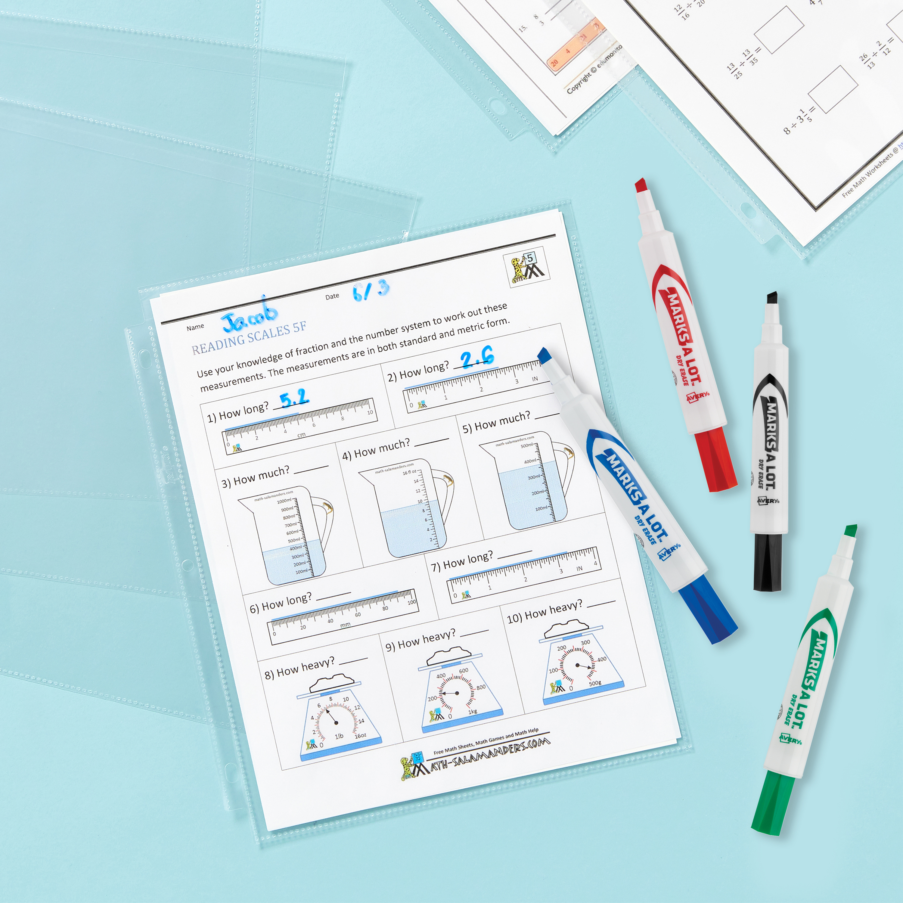 Avery 75540 sheet protectors and Avery 24409 dry erase markers show how to make DIY reusable worksheets. A worksheet is placed in a sheet protector and then the dry erase markers are used to write on the sheet protector.