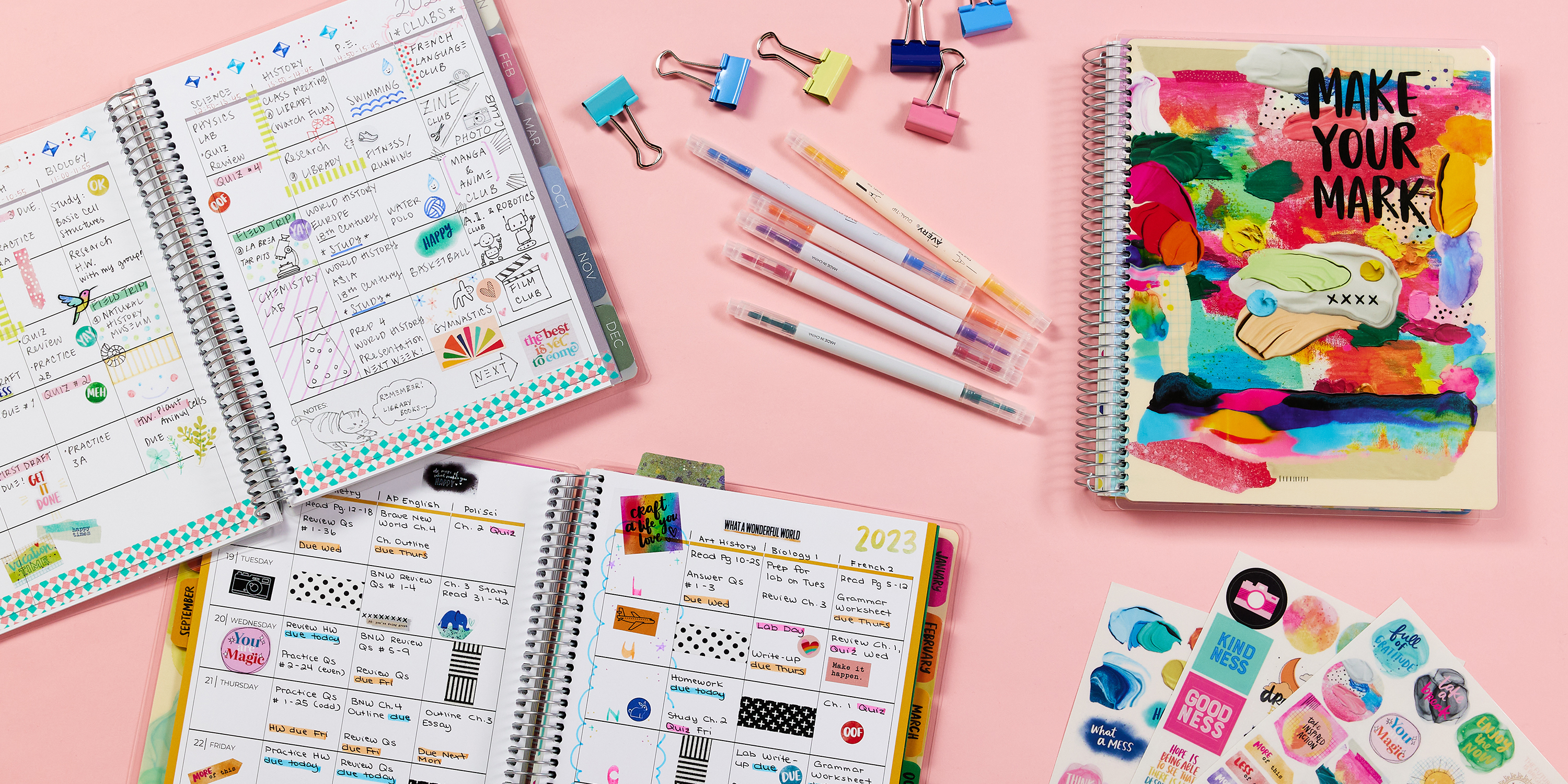 Academic planners are planners dated from July to June to follow the school year. This image shows three Avery academic planners on a pink background surrounded by wet-erase markers, candy-colored binder clips and Avery planner stickers.