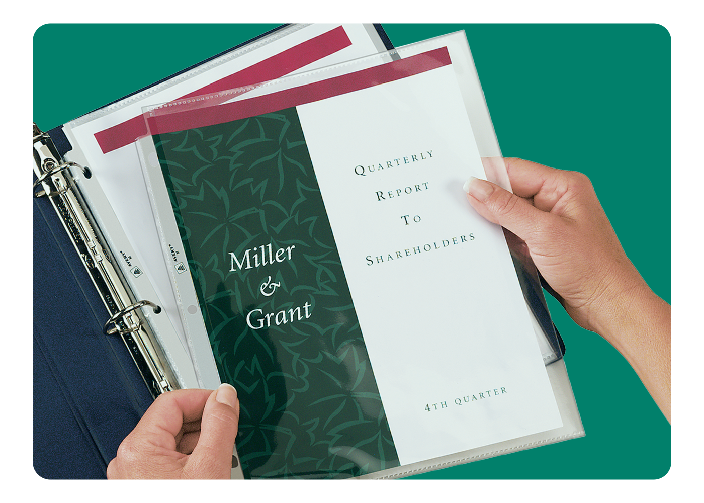 A quarterly shareholder report organized in Avery sheet protectors in a blue binder